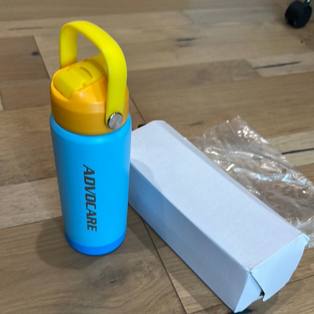 Advocare Blue and Yellow Water Bottle